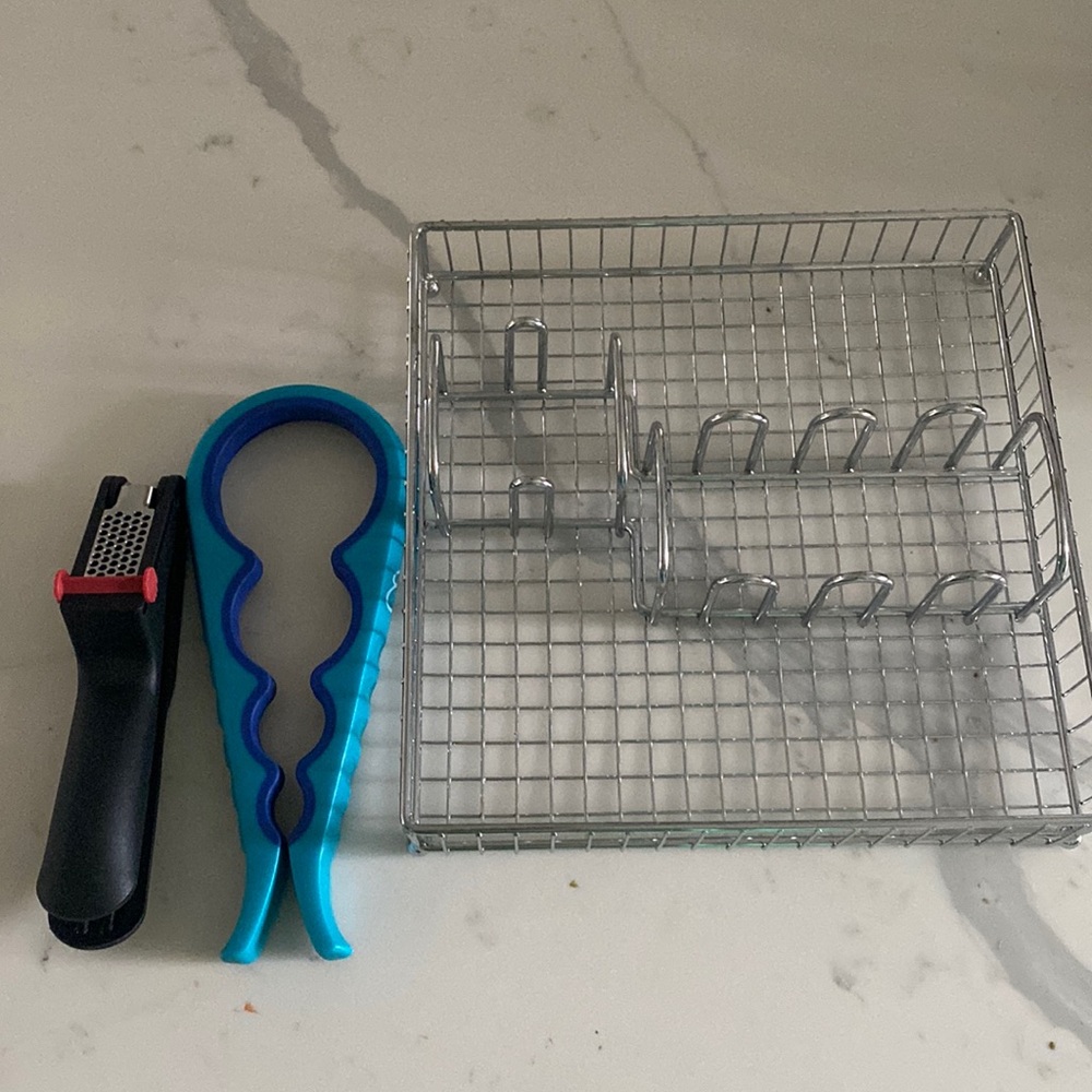 Home goods! Jar opener, garlic press, silverware holder.